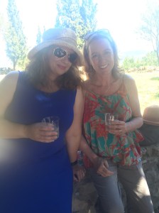 Nichole & Valerie. Background is very white, also over their heads and to the side of Valerie's blue dress. Photo property of Suzanne Spooner.